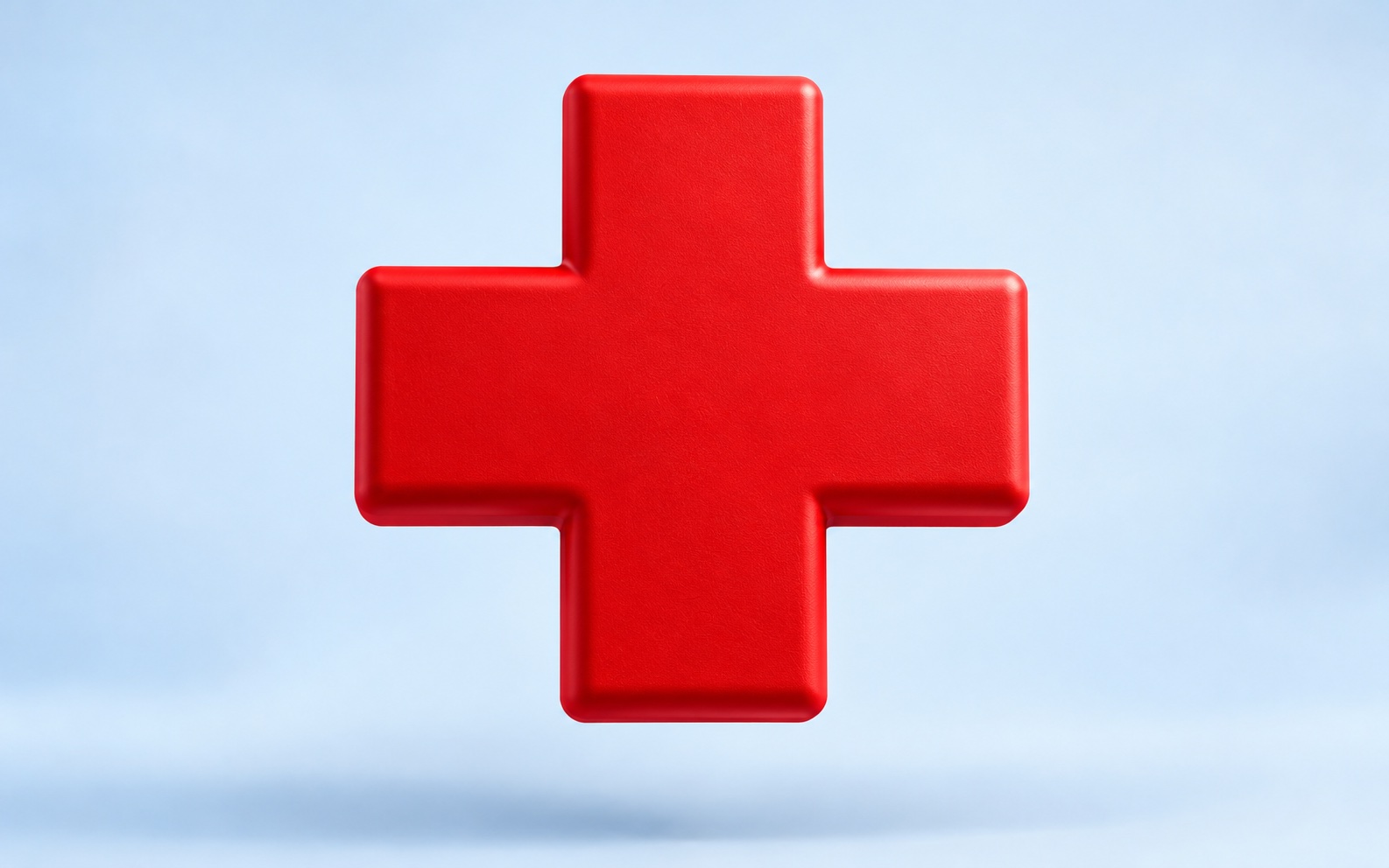 Concept illustration of a red cross on a clean pale blue background